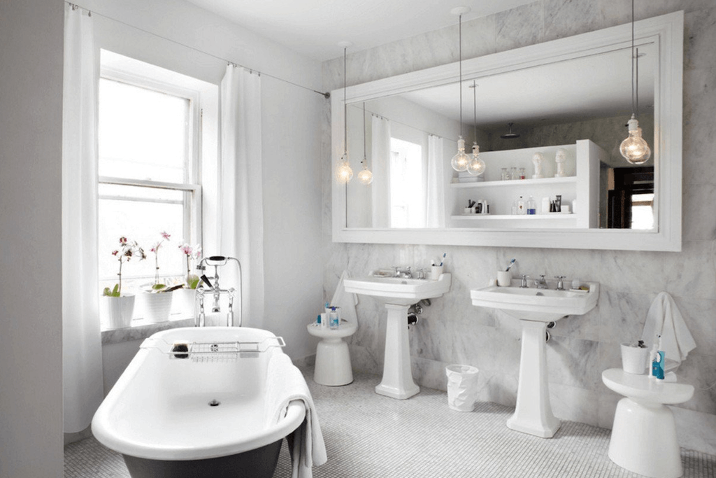 Beautiful bathroom with a white motif, exuding an aesthetic and elegant ambiance.