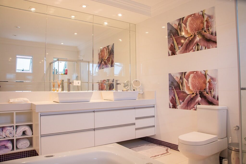 Pink bathroom design in Los Angeles with modern fixtures and stylish decor