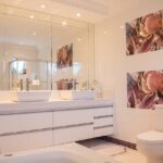 Pink bathroom design in Los Angeles with modern fixtures and stylish decor