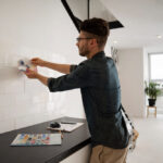 Man designing a kitchen layout for a remodel in Los Angeles